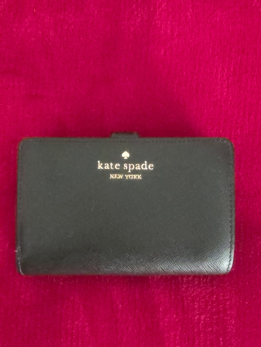 kate spade black leather compact wallet with gold logo